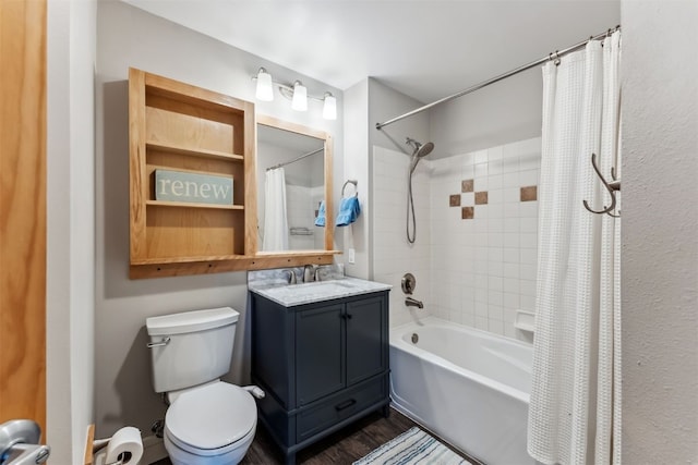 full bath with toilet, vanity, shower / tub combo with curtain, and wood finished floors