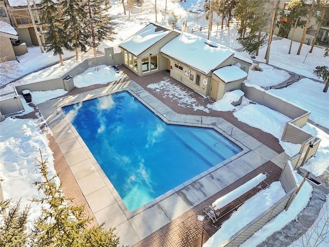 view of snow covered pool