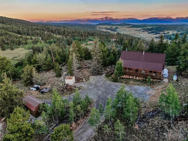 aerial view at dusk with a mountain view