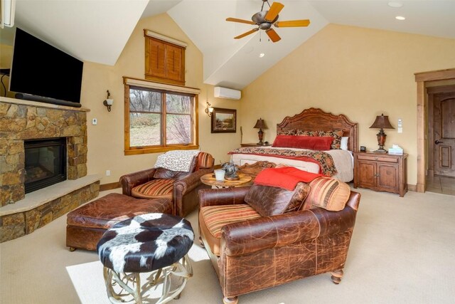 carpeted bedroom with ceiling fan, a fireplace, high vaulted ceiling, and a wall mounted AC