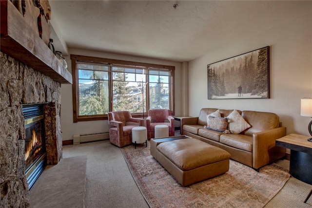 living room with a baseboard heating unit, a fireplace, and light colored carpet