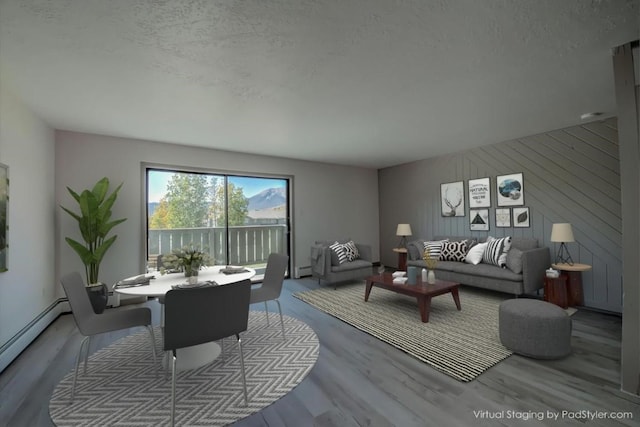 living room with a textured ceiling, wooden walls, a baseboard radiator, and wood-type flooring