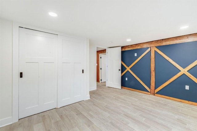 basement with light wood-type flooring