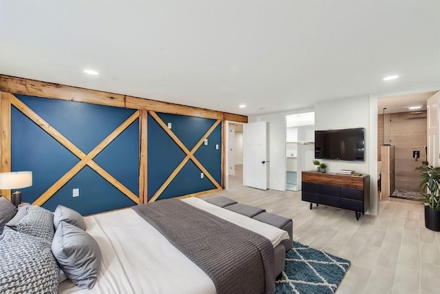 bedroom with light hardwood / wood-style floors