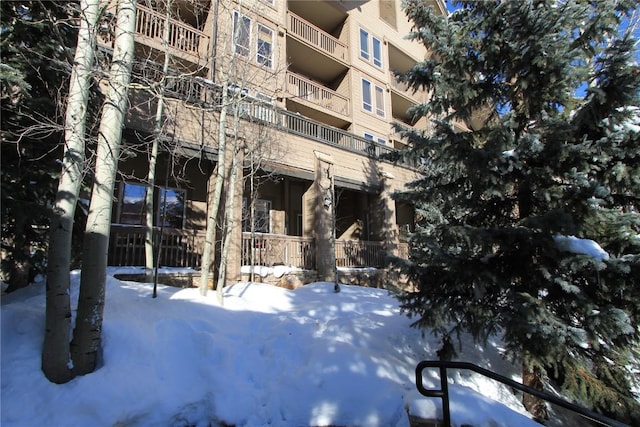 view of snow covered building