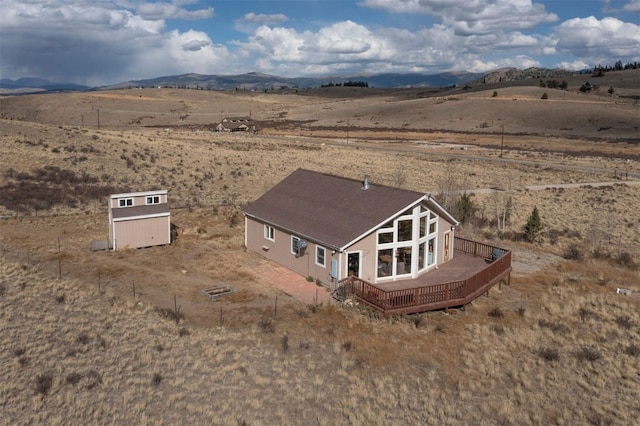 bird's eye view featuring a mountain view and a rural view