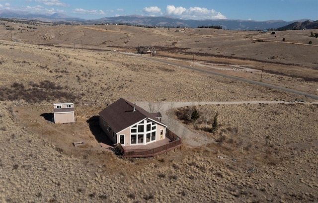 bird's eye view featuring a mountain view and a rural view