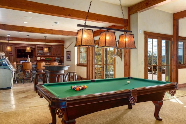 playroom with beam ceiling, billiards, and french doors