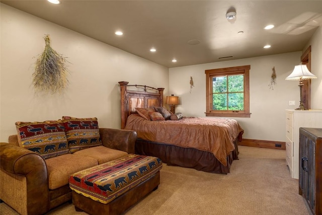 bedroom with light carpet