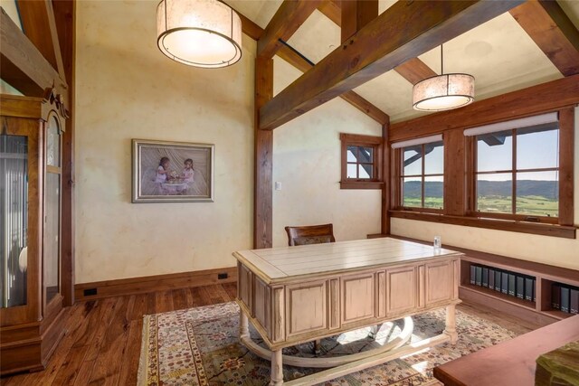 office area featuring vaulted ceiling with beams and dark hardwood / wood-style flooring