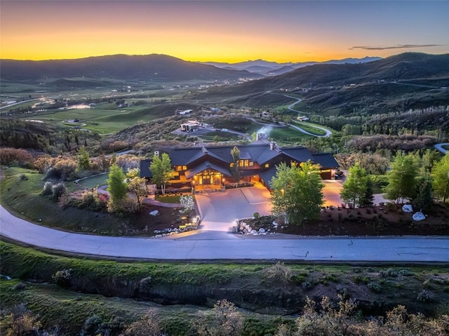 aerial view at dusk with a mountain view