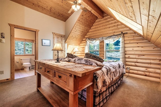 bedroom with connected bathroom, vaulted ceiling with beams, a baseboard heating unit, carpet, and wooden ceiling