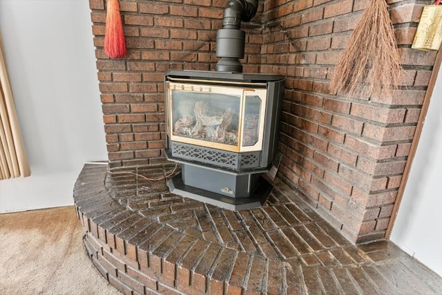 interior details featuring a wood stove