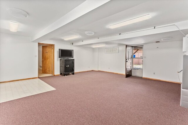 basement featuring carpet flooring