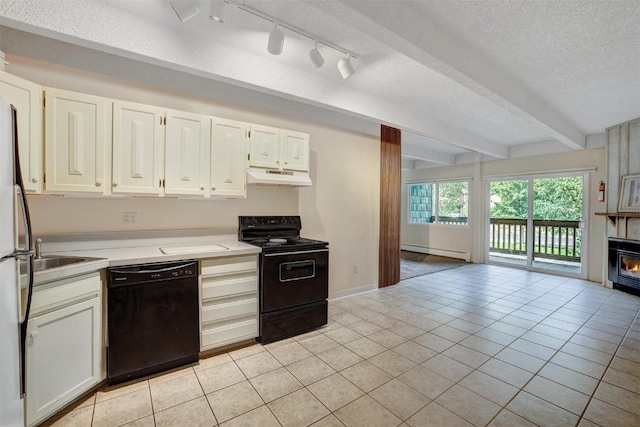 kitchen with a textured ceiling, a baseboard heating unit, black appliances, beamed ceiling, and white cabinetry