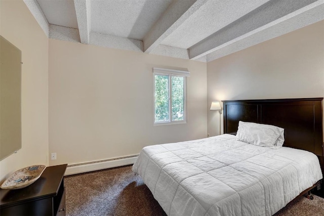 bedroom featuring beam ceiling, dark carpet, and a baseboard heating unit