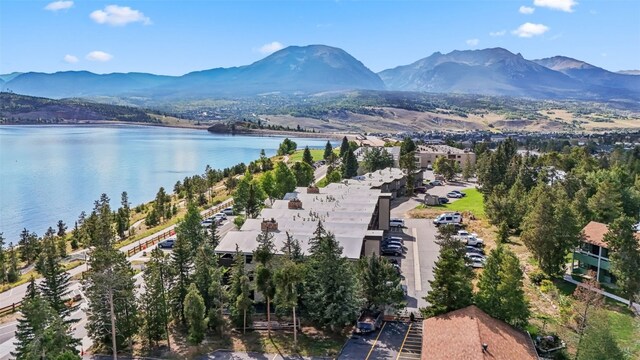 bird's eye view featuring a water and mountain view