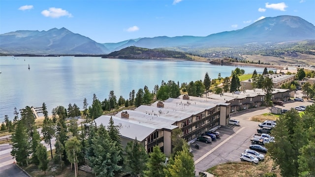 bird's eye view featuring a water and mountain view