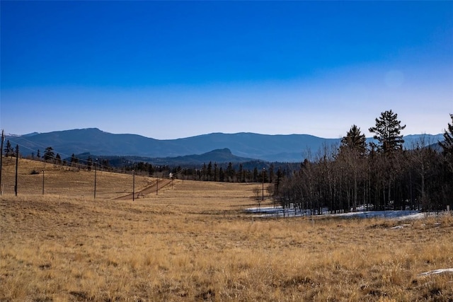 property view of mountains with a rural view