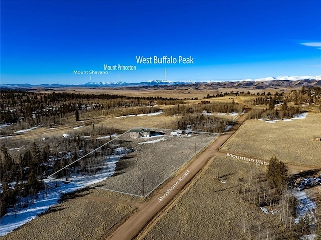 drone / aerial view featuring a mountain view