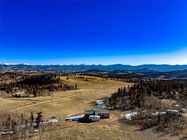 property view of mountains with a rural view