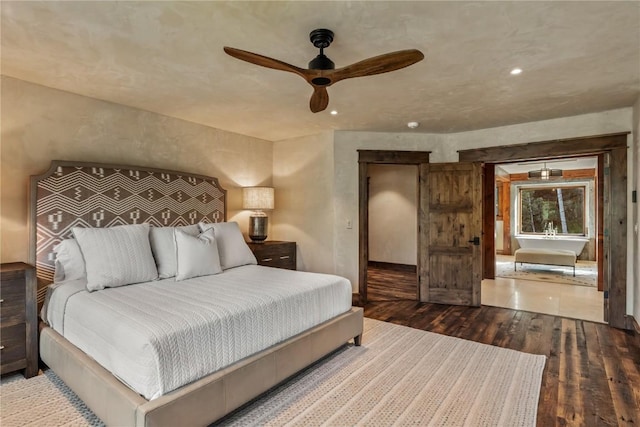 bedroom with hardwood / wood-style flooring and ceiling fan