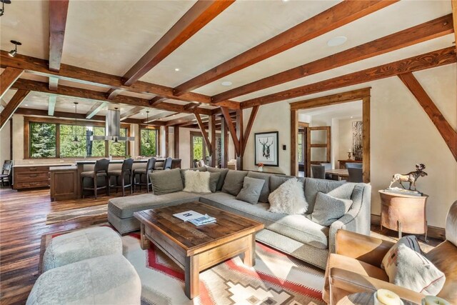 living room with beamed ceiling and hardwood / wood-style flooring