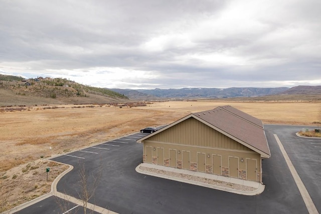 exterior space featuring a mountain view