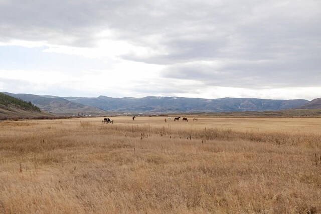 property view of mountains featuring a rural view