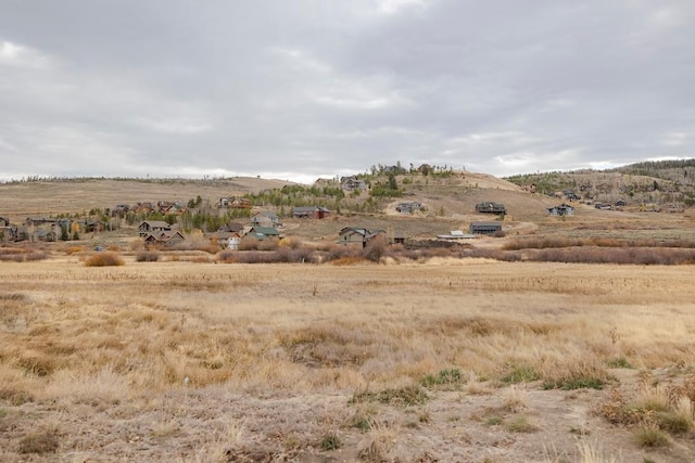 view of mountain feature featuring a rural view