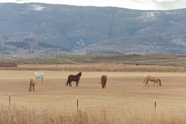 property view of mountains featuring a rural view