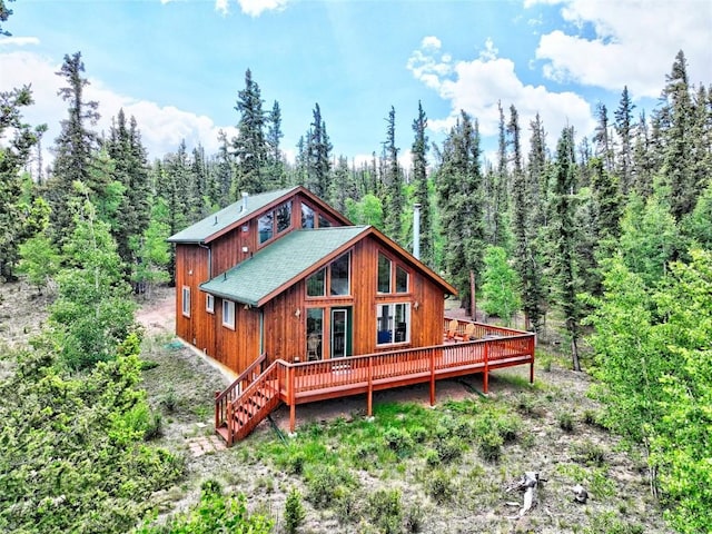 rear view of property with a deck