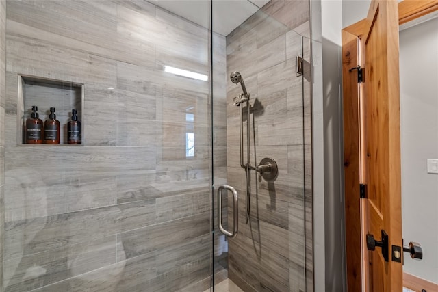 bathroom with an enclosed shower