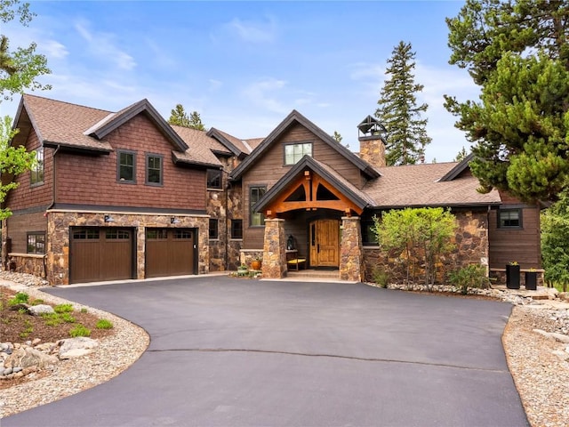 craftsman house with a garage