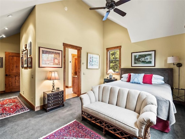 carpeted bedroom featuring high vaulted ceiling and ceiling fan