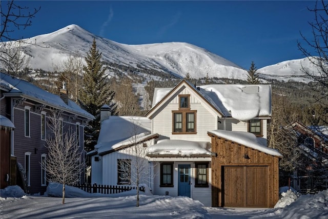 view of front of property with a mountain view