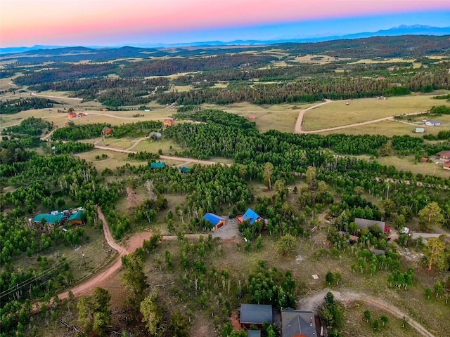 aerial view at dusk with a mountain view