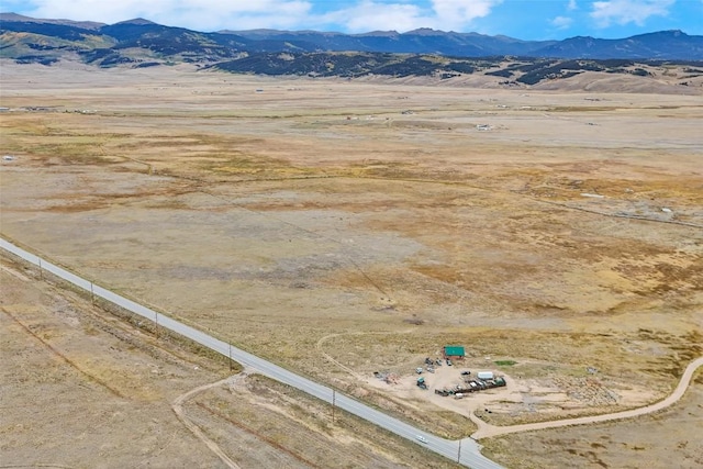 property view of mountains featuring a rural view