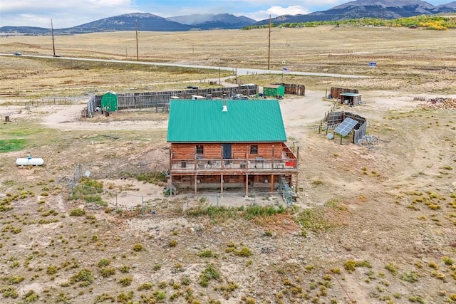 bird's eye view with a mountain view and a rural view