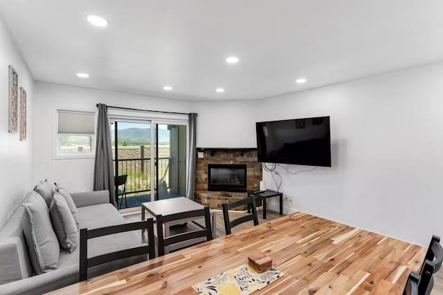 living room featuring a fireplace