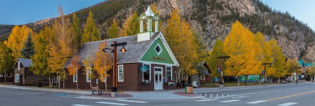 view of building exterior with a mountain view