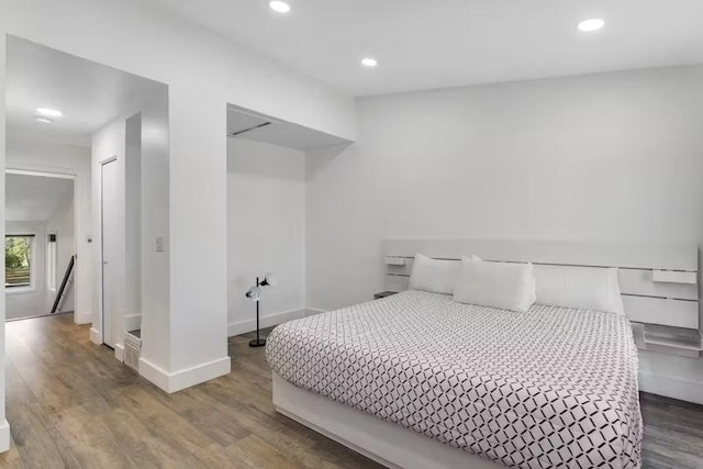 bedroom featuring hardwood / wood-style floors