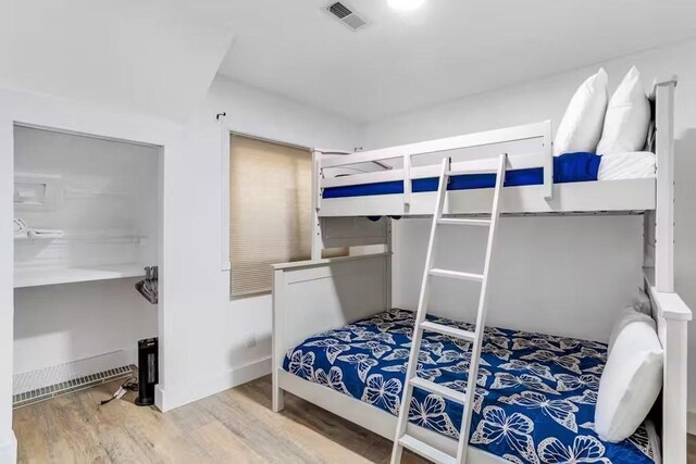 bedroom featuring hardwood / wood-style floors