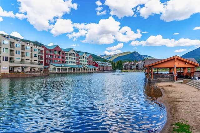 view of water feature featuring a gazebo and a mountain view