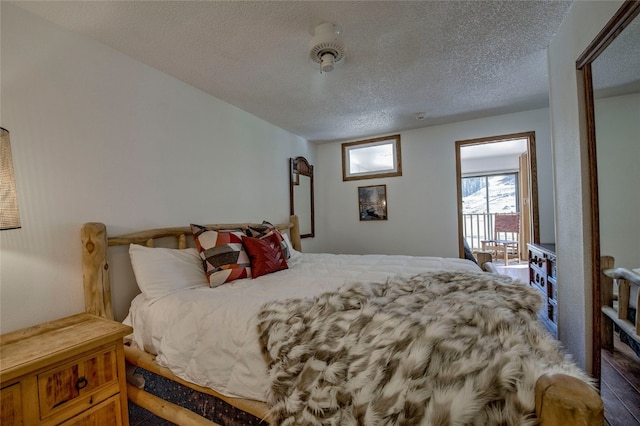 bedroom featuring a textured ceiling