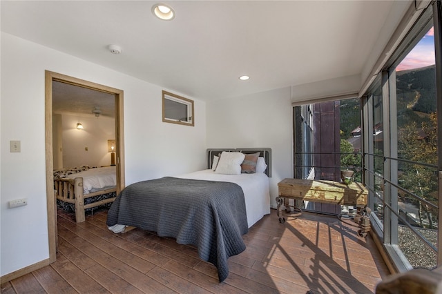 bedroom featuring dark wood-type flooring