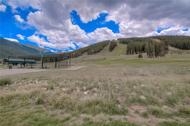 property view of mountains featuring a rural view