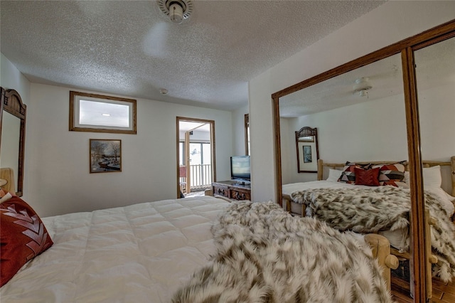 bedroom with a textured ceiling