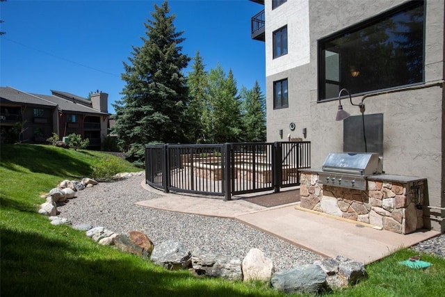 exterior space with area for grilling and a patio