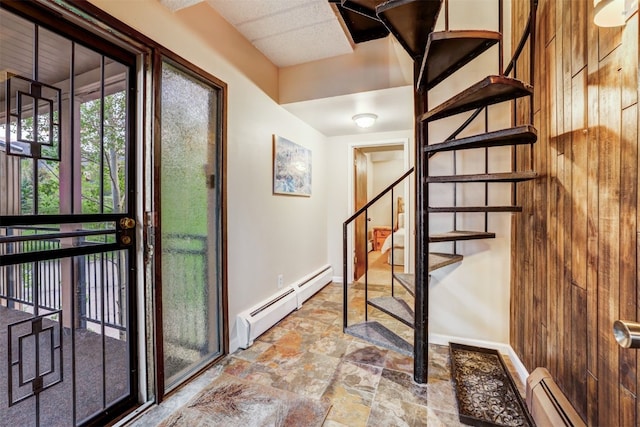 entrance foyer with a baseboard heating unit